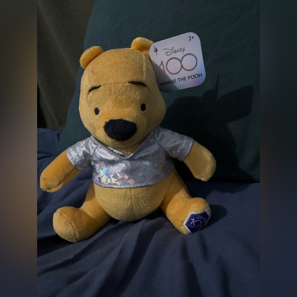 Disney’s 100 yr anniversary Winnie the Pooh Plush with Holographic Silver Shirt